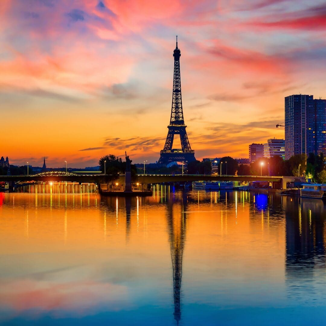 Eiffel Tower at sunset reflected in Seine River, Paris France, Seine dinner cruise Nightingale group trip